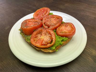 ramp-pesto-over-toast-with-tomatoes